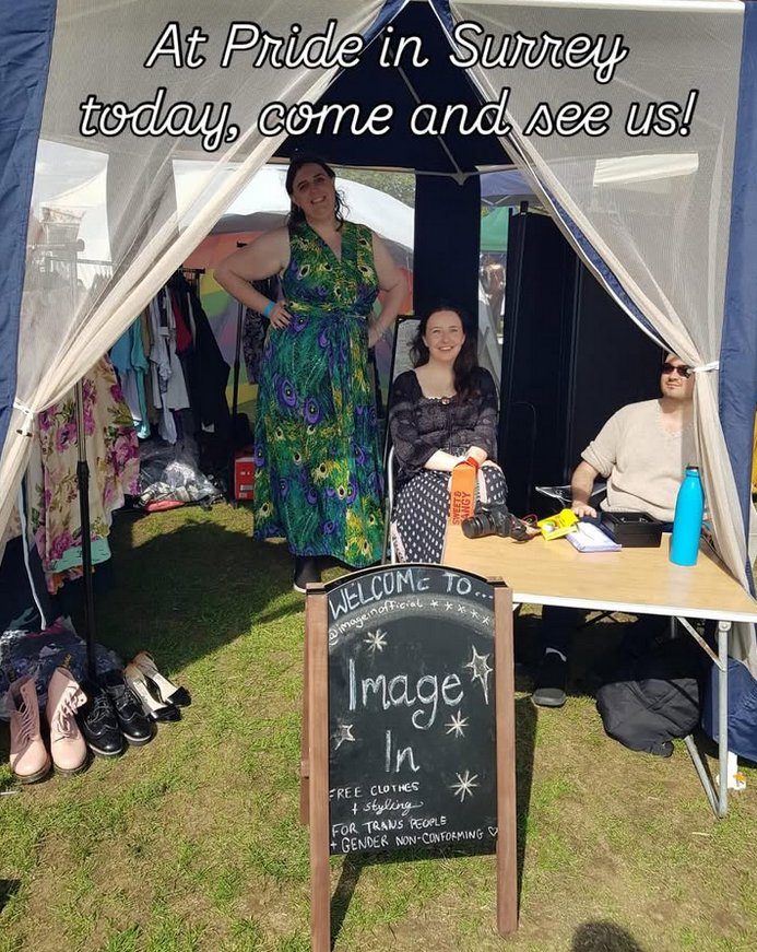 Image In at Pride in Surrey — the team with clothing racks and welcome sign